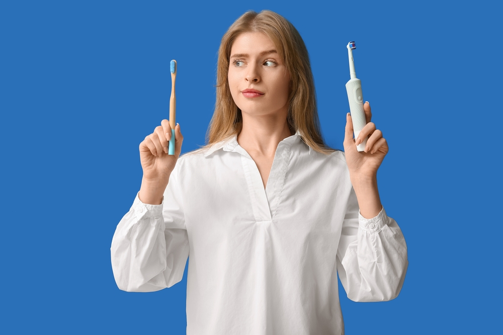 Hoe gebruik ik een elektrische tandenborstel?